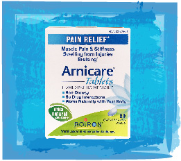 Arnicare Tablets on a blue watercolor background