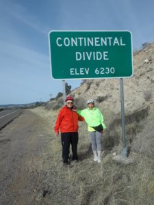 Carol and fellow cyclist Dot at the Continental Divide in western New Mexico, Elev 6230