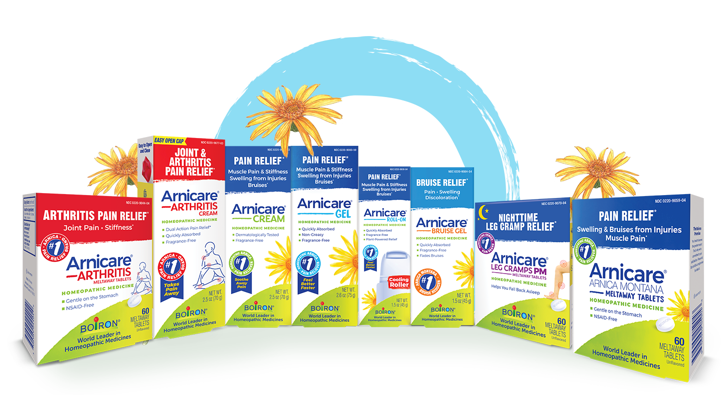 Row of Arnicare homeopathic medicine boxes for arthritis and pain relief, set against a blue circular background with yellow sunflowers in the scene.